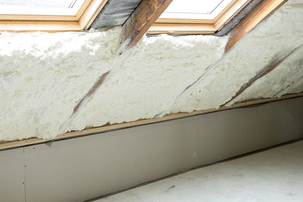 Spray foam insulation removal from roof in London home